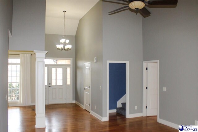 610 Garden Rose Ct, Greer, SC 29651 - foyer entrance with high vaulted ceiling, ceiling fan, wood finished floors, a chandelier, and stairway