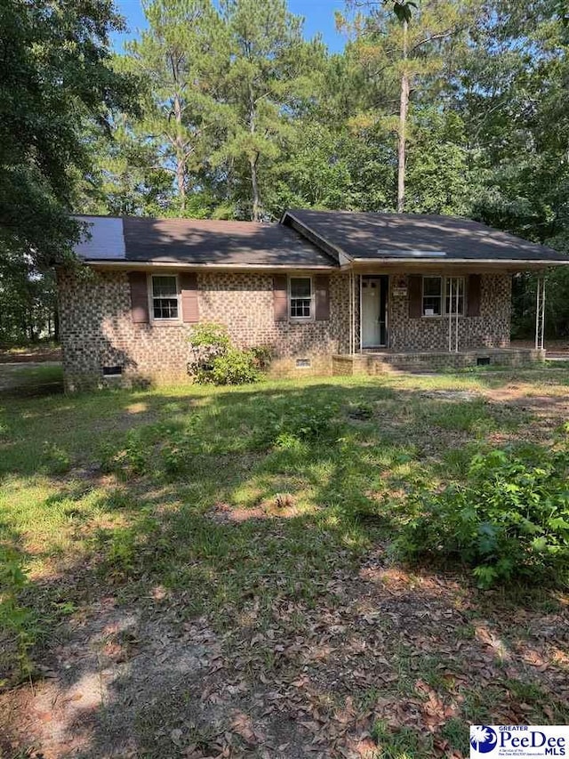 166 Pinestraw Rd, Bennettsville, SC 29512 - ranch-style house with a porch, crawl space, and brick siding
