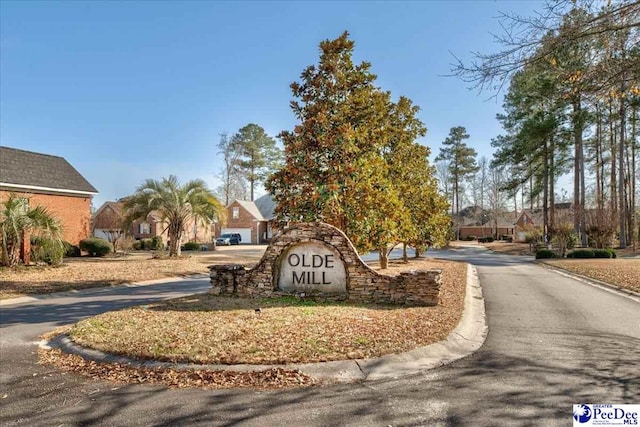 community sign with a garage