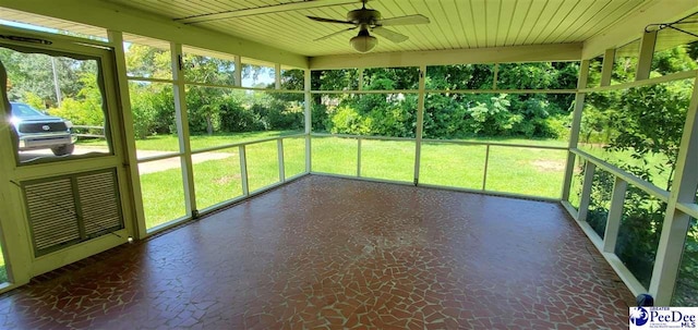 1007 Hamlet Hwy, Bennettsville, SC 29512 - unfurnished sunroom with a ceiling fan and plenty of natural light