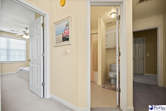 2819 Hermitage Ln, Florence, SC 29501 - hallway with light colored carpet and baseboards