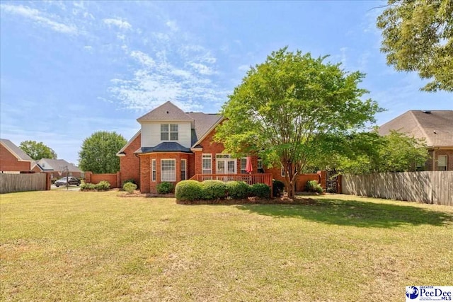 2819 Hermitage Ln, Florence, SC 29501 - view of front of house featuring brick siding and a wooden deck