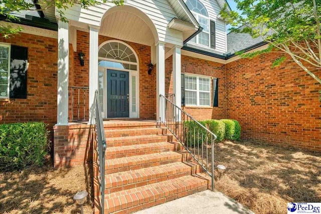 2819 Hermitage Ln, Florence, SC 29501 - doorway to property featuring brick siding