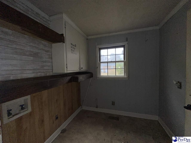 laundry area featuring hookup for a washing machine and ornamental molding