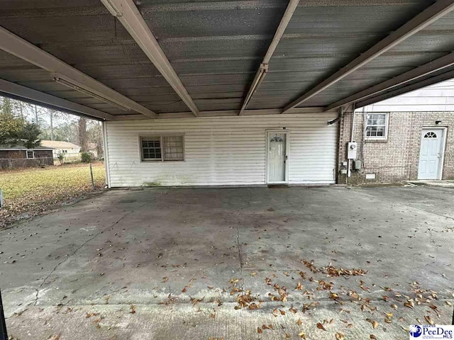 view of patio / terrace with a carport