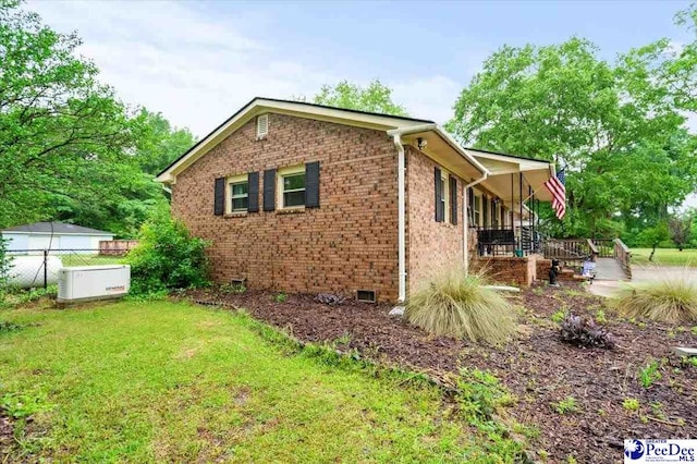 1017 Big Swamp Rd, Pamplico, SC 29583 - view of property exterior featuring brick siding and crawl space