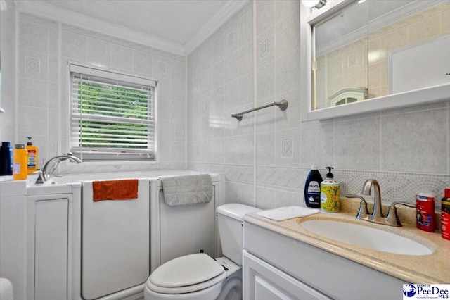 1017 Big Swamp Rd, Pamplico, SC 29583 - full bathroom featuring tile walls, crown molding, toilet, tasteful backsplash, and vanity