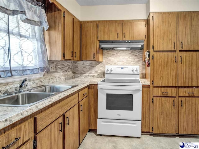 kitchen featuring white electric range, sink, and backsplash