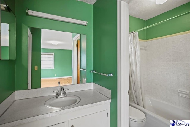 full bath featuring toilet, shower / tub combo, a textured ceiling, and vanity