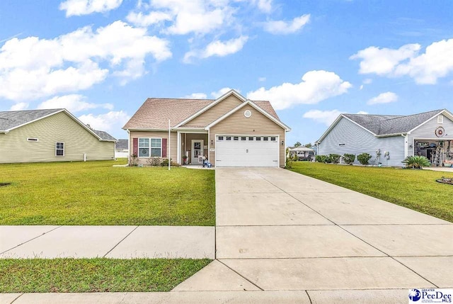 view of front of house with a garage and a front lawn