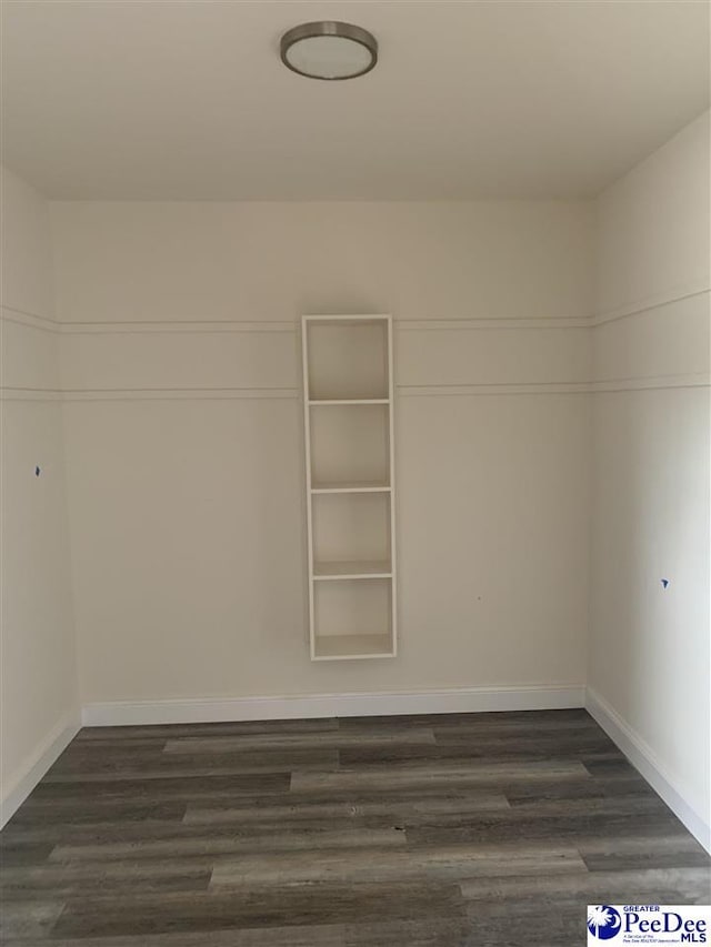 4978 E National Cemetery Rd, Florence, SC 29506 - spacious closet with dark wood-style floors