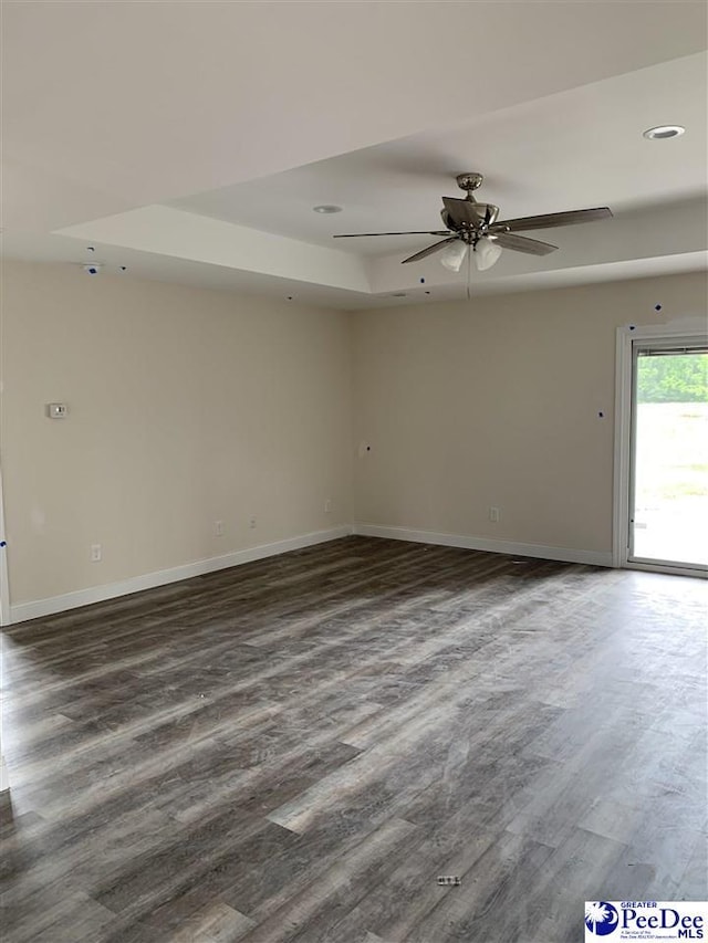 4978 E National Cemetery Rd, Florence, SC 29506 - empty room featuring a ceiling fan, baseboards, dark wood-type flooring, and recessed lighting