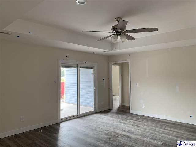 4978 E National Cemetery Rd, Florence, SC 29506 - unfurnished room featuring a ceiling fan, baseboards, and wood finished floors