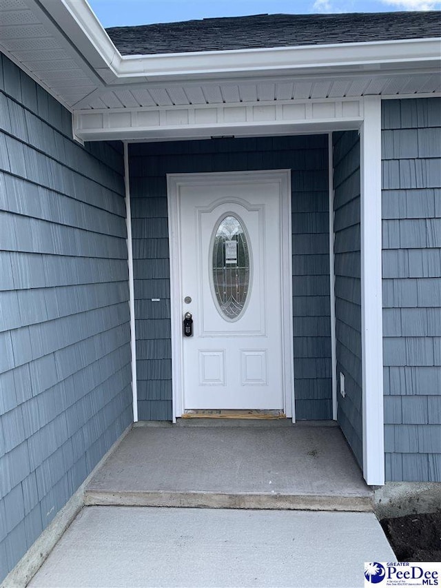 4978 E National Cemetery Rd, Florence, SC 29506 - property entrance with roof with shingles