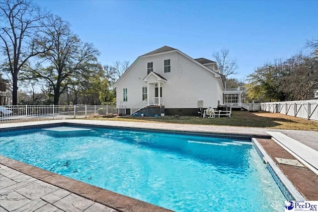 view of swimming pool featuring a fenced in pool and a fenced backyard