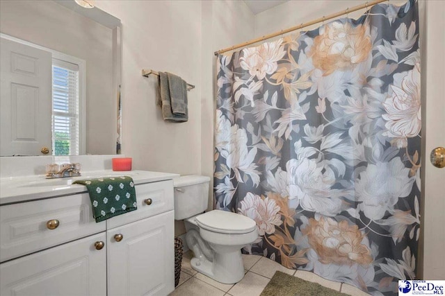 bathroom featuring tile patterned floors, vanity, toilet, and a shower with curtain