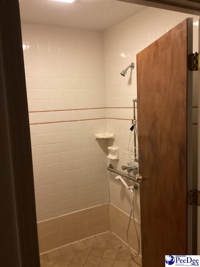 429 S Wallace Rd, Florence, SC 29506 - bathroom with a tile shower and tile patterned floors