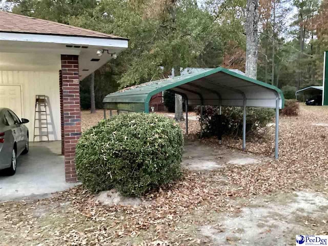 429 S Wallace Rd, Florence, SC 29506 - view of vehicle parking featuring a carport