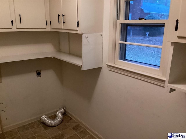 429 S Wallace Rd, Florence, SC 29506 - laundry room featuring electric dryer hookup and cabinets