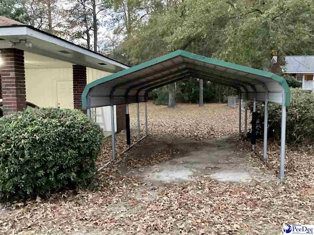 429 S Wallace Rd, Florence, SC 29506 - view of vehicle parking with a carport