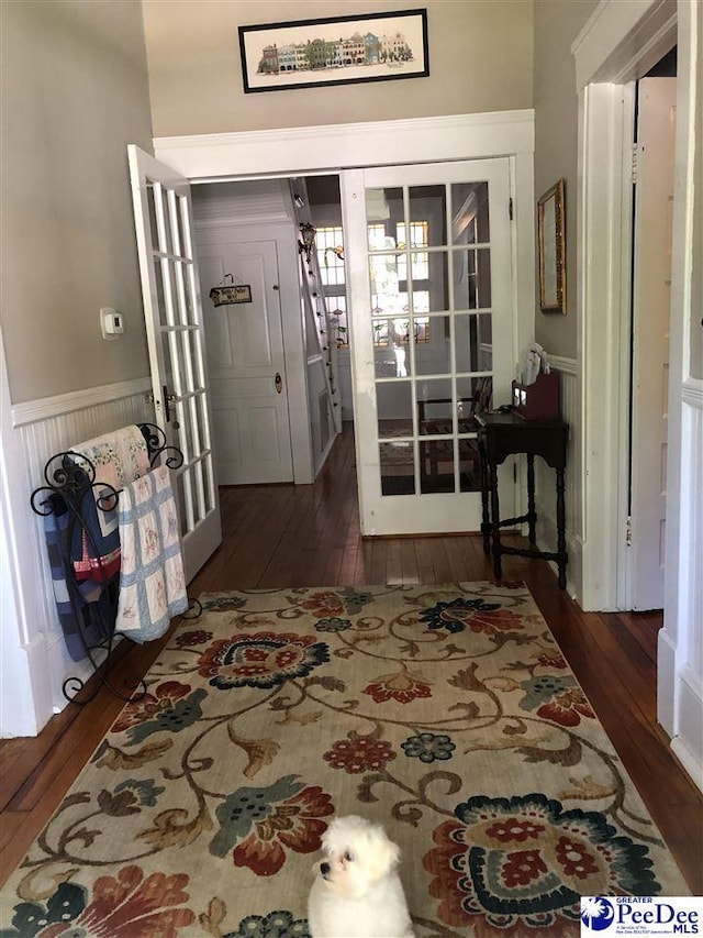 interior space featuring dark hardwood / wood-style flooring and french doors