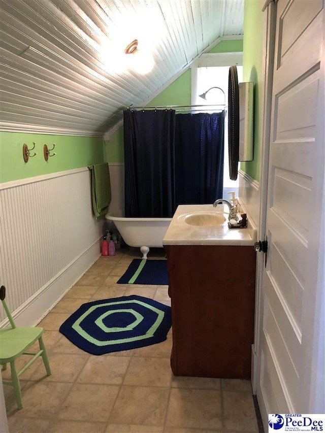 bathroom with vanity, lofted ceiling, shower with separate bathtub, and wood ceiling