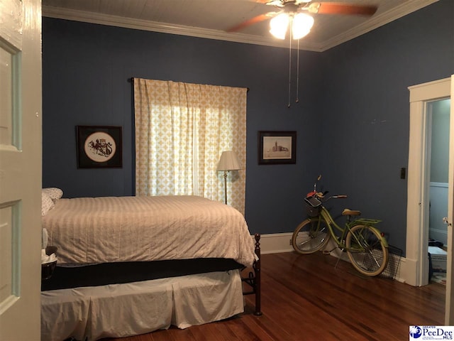 bedroom featuring ceiling fan, ornamental molding, and hardwood / wood-style floors