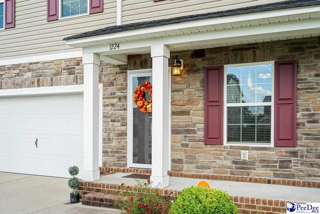 property entrance featuring a garage