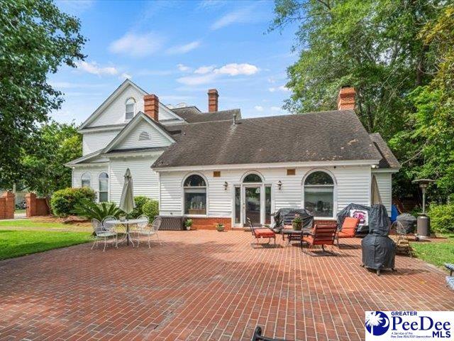 back of house featuring a patio area