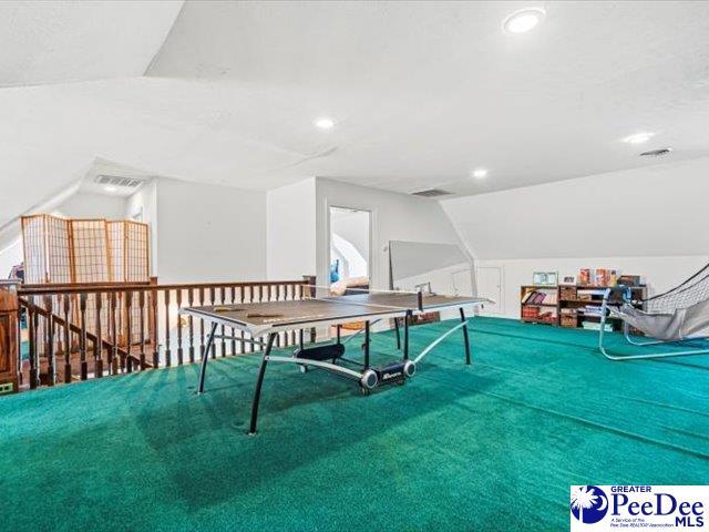 playroom with vaulted ceiling