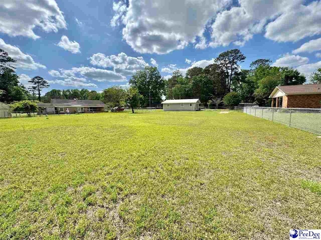 view of yard with fence