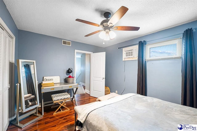 500UNIT31 Woodland, Florence, SC 29501 - bedroom with wood finished floors, a textured ceiling, a closet, and ceiling fan