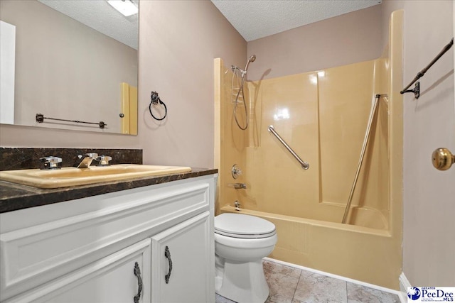 full bathroom featuring a textured ceiling, toilet, washtub / shower combination, and vanity