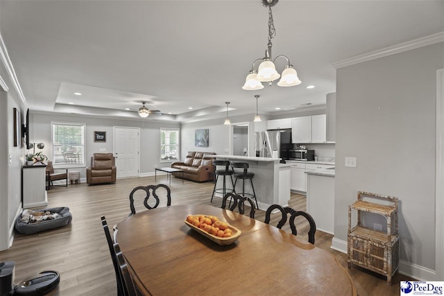 515 Young St, Darlington, SC 29532 - dining room with recessed lighting, ornamental molding, light wood-type flooring, baseboards, and a chandelier