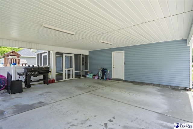 515 Young St, Darlington, SC 29532 - view of patio featuring a carport, grilling area, and fence