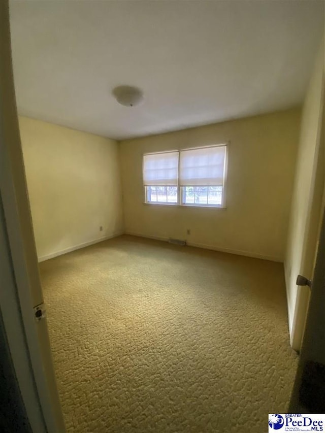 112 Williamson Pl, Darlington, SC 29532 - spare room featuring light colored carpet and baseboards