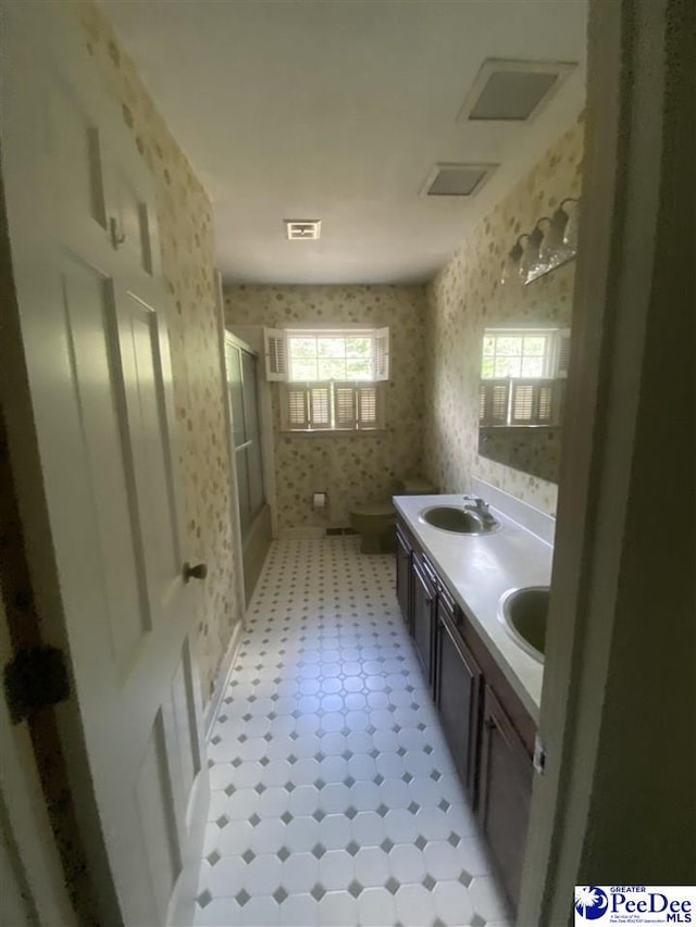 112 Williamson Pl, Darlington, SC 29532 - full bathroom with wallpapered walls, a shower stall, tile patterned floors, and double vanity
