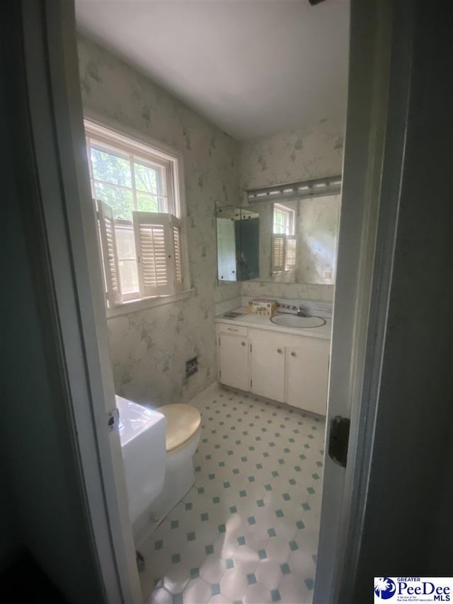 112 Williamson Pl, Darlington, SC 29532 - bathroom featuring vanity, tile patterned floors, and wallpapered walls