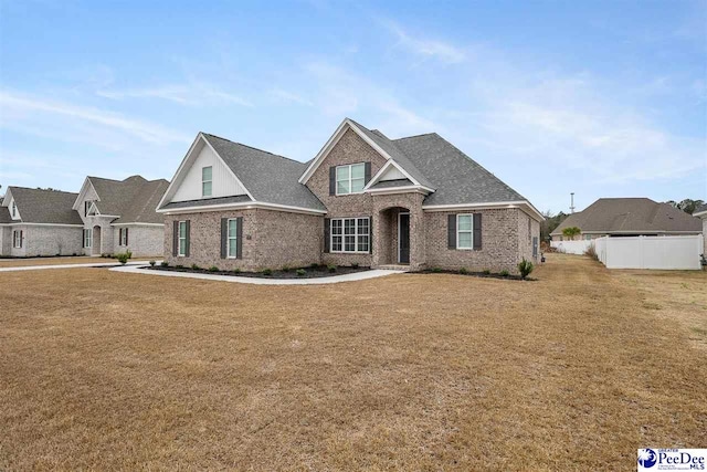 view of front of property with a front lawn