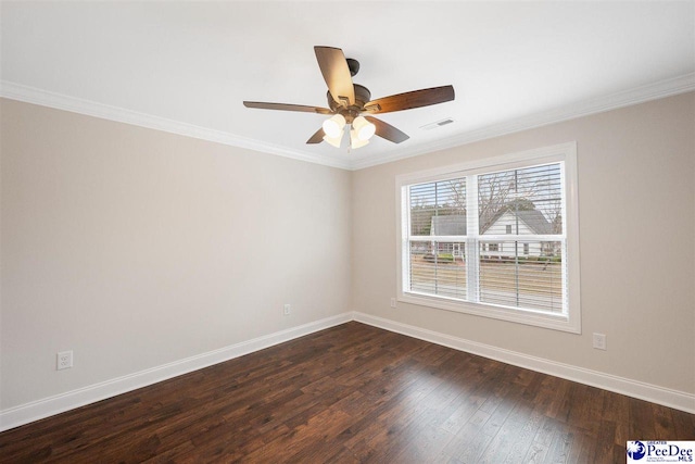 unfurnished room featuring crown molding, dark wood-type flooring, and ceiling fan