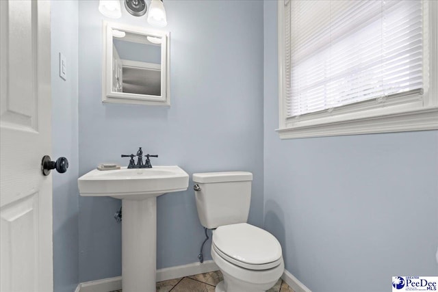 3900 Claussen Rd, Florence, SC 29505 - half bath with baseboards and tile patterned flooring
