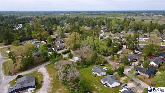 813 Williams St, Lake City, SC 29560 - birds eye view of property featuring a wooded view and a residential view