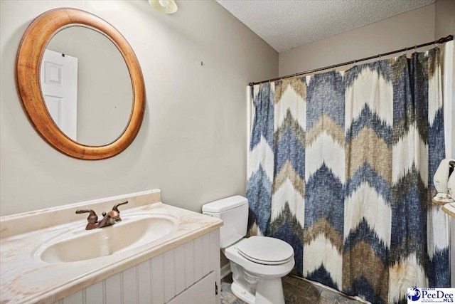 813 Williams St, Lake City, SC 29560 - bathroom with toilet, vanity, curtained shower, and a textured ceiling