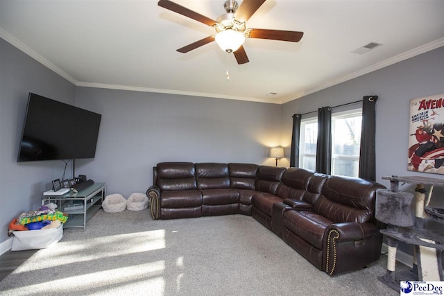 living room featuring ornamental molding and ceiling fan