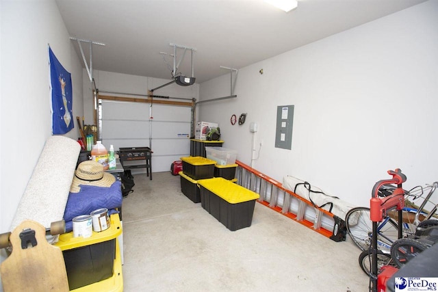 garage featuring a garage door opener and electric panel