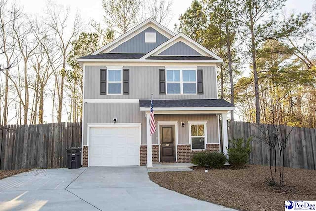 craftsman house with a garage