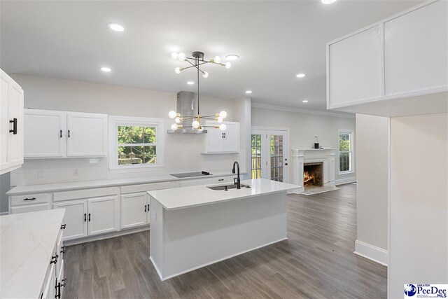 400 Millstone Rd, Florence, SC 29505 - kitchen featuring a sink, a chandelier, a premium fireplace, extractor fan, and dark wood finished floors