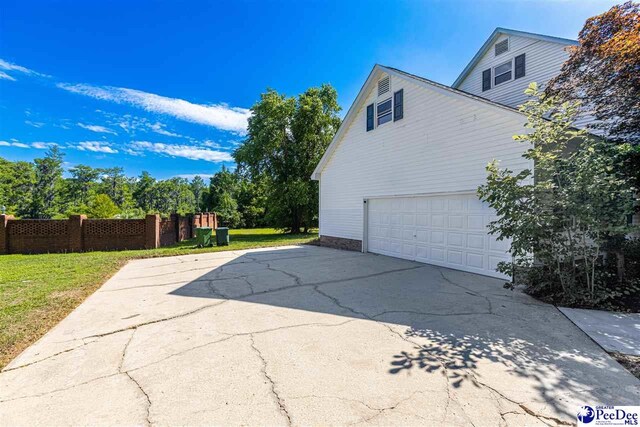 400 Millstone Rd, Florence, SC 29505 - view of property exterior with driveway and an attached garage