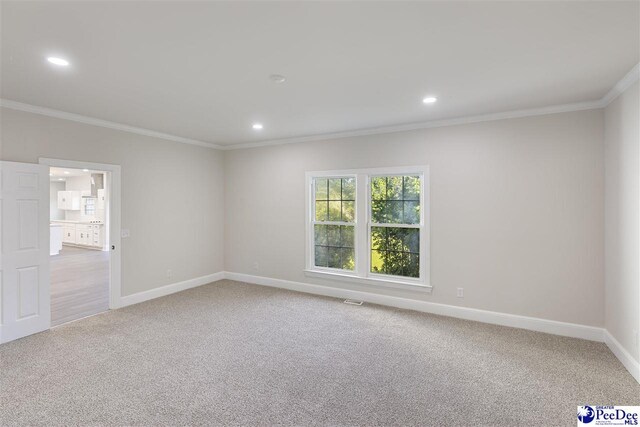 400 Millstone Rd, Florence, SC 29505 - carpeted spare room with crown molding, baseboards, and recessed lighting