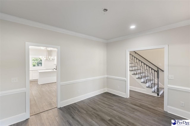 400 Millstone Rd, Florence, SC 29505 - spare room with ornamental molding, dark wood-type flooring, stairway, a chandelier, and baseboards